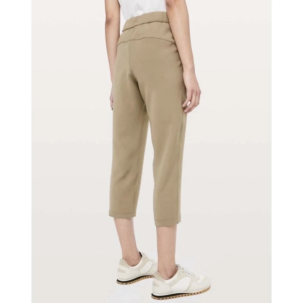 Lululemon‎ On The Fly Crop Pants Size 10 Khaki Woven Drawstring Stretch Casual